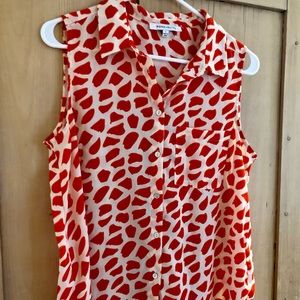 Animal print sleeveless button down top